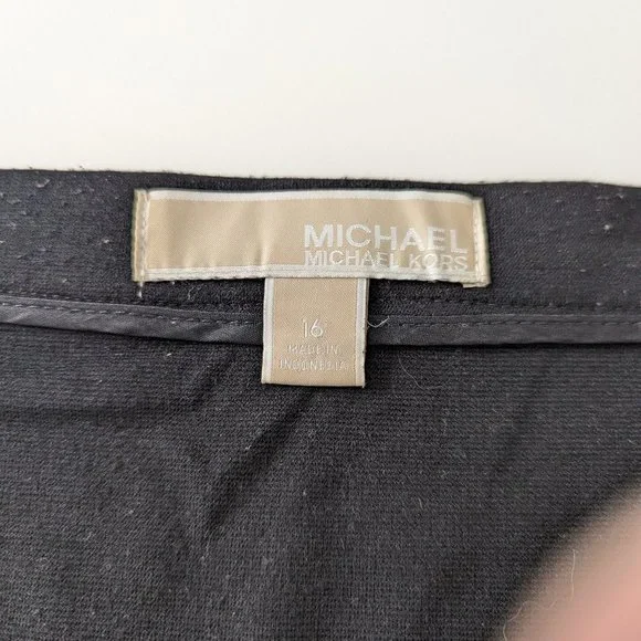 Michael Kors Black Mini Skirt with Silver Grommet Border - Picture 7 of 7